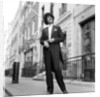 Phil Lynott in London, modelling clothes from Saville Row. 1983 by Mike Maloney