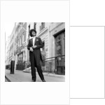 Phil Lynott in London, modelling clothes from Saville Row. 1983 by Mike Maloney
