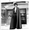 Phil Lynott in London, modelling clothes from Saville Row. 1983 by Mike Maloney
