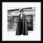 Phil Lynott in London, modelling clothes from Saville Row. 1983 by Mike Maloney