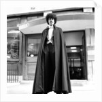 Phil Lynott in London, modelling clothes from Saville Row. 1983 by Mike Maloney