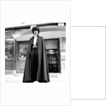 Phil Lynott in London, modelling clothes from Saville Row. 1983 by Mike Maloney