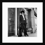 Phil Lynott in London, modelling clothes from Saville Row. 1983 by Mike Maloney