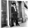 Phil Lynott in London, modelling clothes from Saville Row. 1983 by Mike Maloney