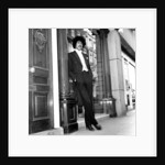 Phil Lynott in London, modelling clothes from Saville Row. 1983 by Mike Maloney