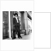 Phil Lynott in London, modelling clothes from Saville Row. 1983 by Mike Maloney