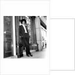 Phil Lynott in London, modelling clothes from Saville Row. 1983 by Mike Maloney
