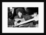 Phil Lynott of Thin Lizzy during a recording session for the groups new album. by Andy Hosie