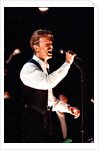 David Bowie performing at The Birmingham NEC, as part of his 1990 Sound and Vision World Tour. by Dick Williams