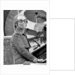 Elton John performing on stage at Wembley Stadium., London, England in June 1975 by Chris Barham