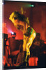 Backing dancer performing on stage by Richard Nelmes