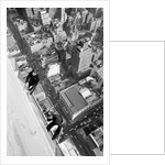 Workmen busy cleaning windows 1000 ft up the Empire State building by Daily Herald