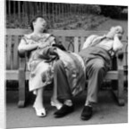 Old couple dozing in the sun at Serpentine Lido by Bob Hope