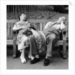 Old couple dozing in the sun at Serpentine Lido by Bob Hope