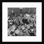 People sunbathing in a heatwave at the Serpentine Lido by Tommy Lea
