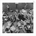 People sunbathing in a heatwave at the Serpentine Lido by Tommy Lea