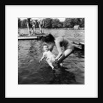 People sunbathing in a heatwave at the Serpentine Lido by Tommy Lea