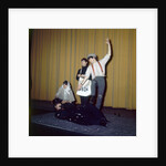 The Beatles in costume by Arthur Sidey