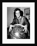 Cliff Richard with a globe by Anonymous