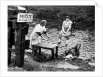 A trolley 'chair' being used by residents to cross the River Cart, Glasgow by Anonymous