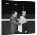 Manchester City new signing Denis Law with Ken Barnes trying his new shirt for size by Thomas