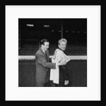 Manchester City new signing Denis Law with Ken Barnes trying his new shirt for size by Thomas