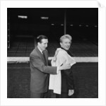 Manchester City new signing Denis Law with Ken Barnes trying his new shirt for size by Thomas
