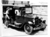 A female passenger entering one of the new London taxi cabs by Staff