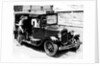 A female passenger entering one of the new London taxi cabs by Staff