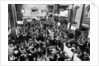 Busy scenes showing crowds of traders in a hurry at the London Stock Exchange by Reed