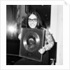 Nana Mouskouri presented with a gold disc by Maurice Kaye