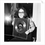 Nana Mouskouri presented with a gold disc by Maurice Kaye