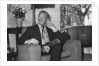 David Niven relaxes in his hotel suite in London by Anonymous