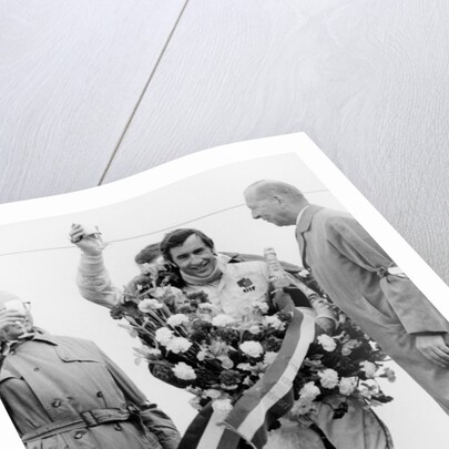 Jackie Stewart, celebrating victory at The Dutch Grand Prix, Zandvoort, 1968 by Unknown
