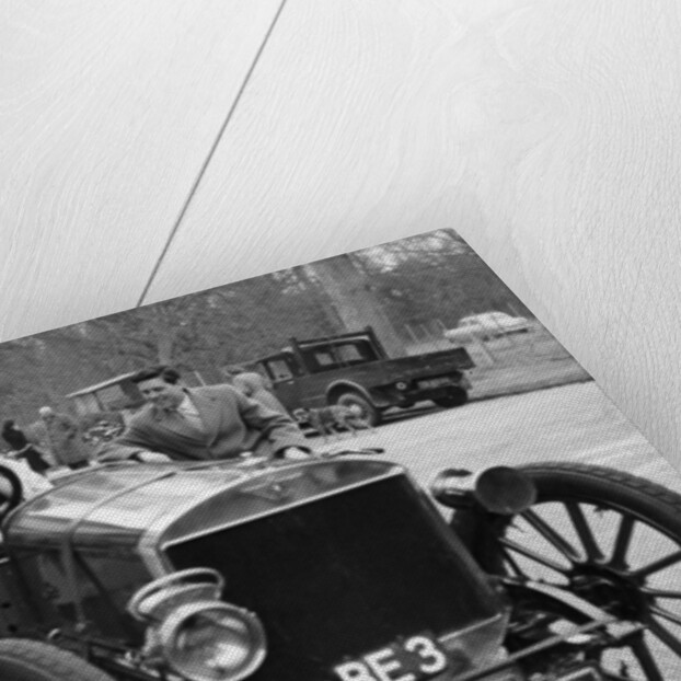 Lord Brabazon in the driver's seat of a vintage car, 1956 by Unknown