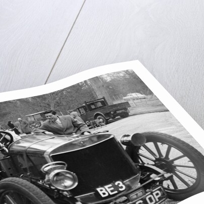 Lord Brabazon in the driver's seat of a vintage car, 1956 by Unknown