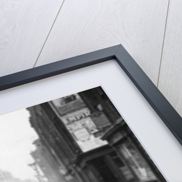 A Rover 1928 10/25 HP sports car parked in a London street, 1931 by Unknown