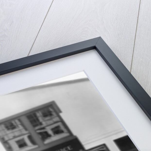 1932 Ford V8 in front of a car showroom, (c1932?) by Unknown