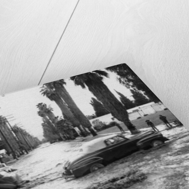 Cars on a flooded road in California, USA by Unknown