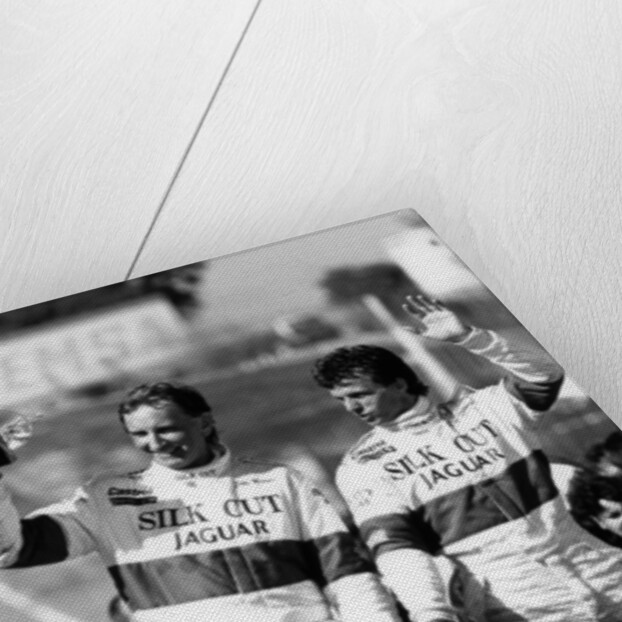 John Watson and Jan Lammers waving at the crowds at Jarama, Spain, 1987 by Unknown