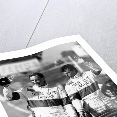 John Watson and Jan Lammers waving at the crowds at Jarama, Spain, 1987 by Unknown