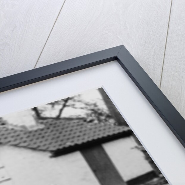Donald Campbell outside a garage at Headley Grove, Surrey, 1938 by Unknown