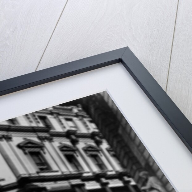 Female chauffeur standing by a 1964 Morris Oxford, 1964 by Unknown