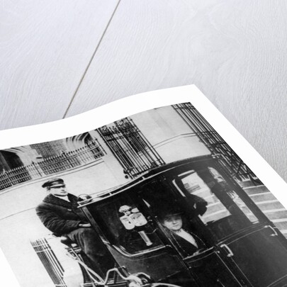 Woman passenger in a 1910 taxi cab, New York, USA, (c1910?) by Unknown