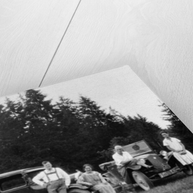 A group of people on an outing with their cars, c1929-c1930 by Unknown