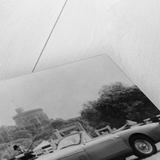 An Aston Martin DB2-4 MKII, with Windsor Castle in the background, 1956 by Unknown
