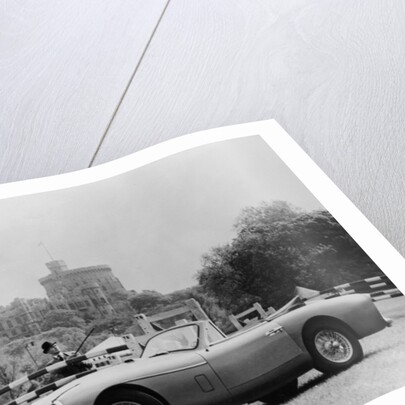 An Aston Martin DB2-4 MKII, with Windsor Castle in the background, 1956 by Unknown