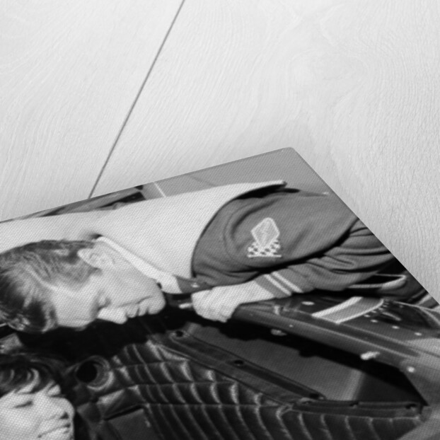 Craig Breedlove explaining the controls of 'Spirit of America Sonic I' to his wife, Lee, c1965 by Unknown