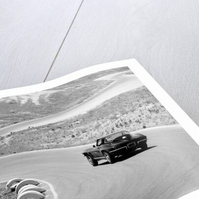 1964 Chevrolet Corvette Stingray on a winding racetrack, (c1964?) by Unknown