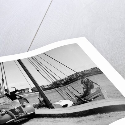 A Citroën 2CV on the quay at a harbour, c1957 by Unknown